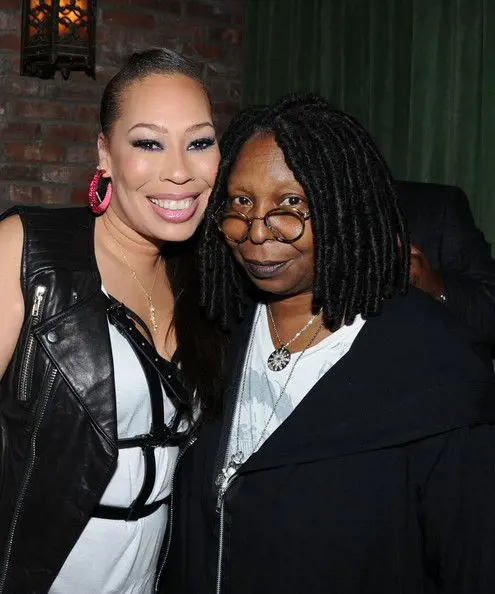Alex taking picture with her mum Whoopi