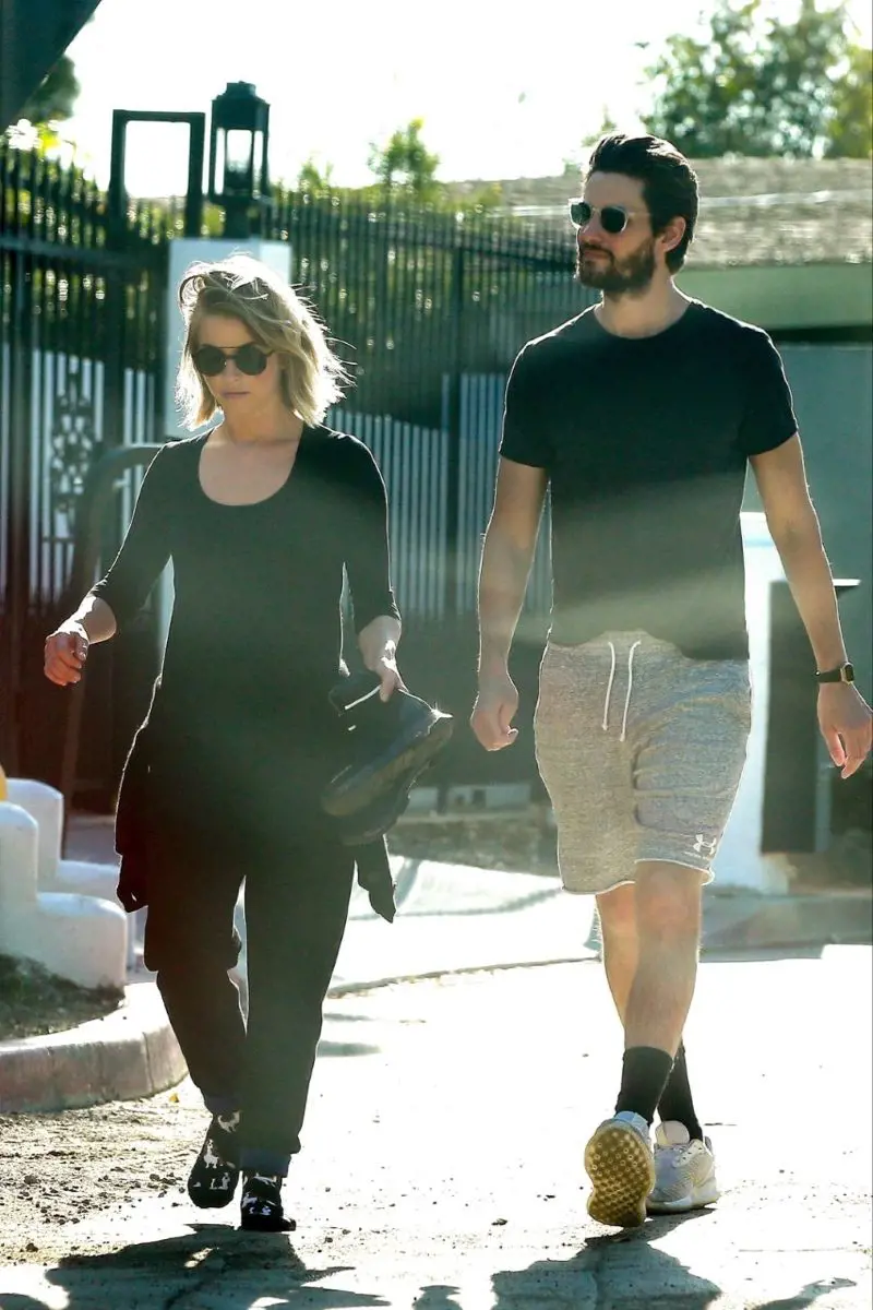 Ben and Julian walking together on the streets during daytime 