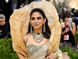 Isha Ambani Met Gala 2026, Isha Ambani diamonds, Met Gala 2026, Isha Ambani saree, Met Gala viral looks, celebrity fashion 2026, Isha Ambani jewellery, Bollywood Met Gala, luxury celebrity fashion, viral Met Gala moments, Indian fashion global stage, celebrity style news, diamond jewellery look, ShowBizCast, Hollywood fashion news,
